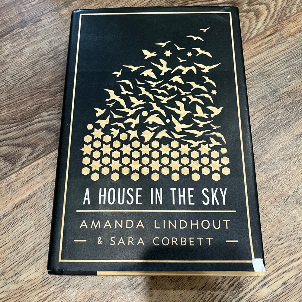 📚2/$12- books: A House in the Sky Hardcover Book